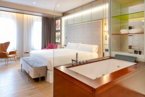 Voodi või voodid majutusasutuse Barceló Ourense toas