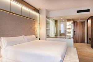 Voodi või voodid majutusasutuse Barceló Ourense toas