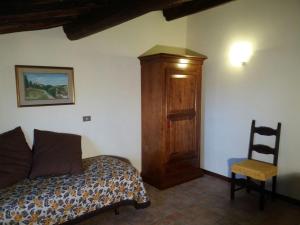 Posteľ alebo postele v izbe v ubytovaní Podere Il Caggio Rooms