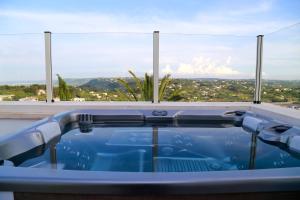 a swimming pool with a view of a city at Villa Angelina in Selva di Fasano