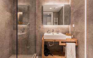 A bathroom at Acropolis Luxury Living