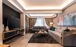 A seating area at Acropolis Luxury Living