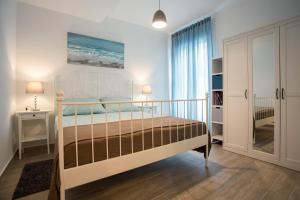 Postel nebo postele na pokoji v ubytování Cozy Coastal apartment GaMa
