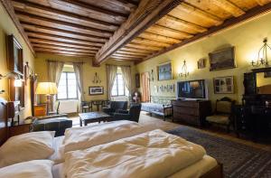 En eller flere senger på et rom på Hotel Leonardo
