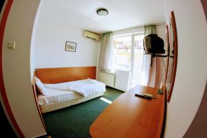 Postel nebo postele na pokoji v ubytování R&G Hotel