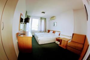 Postel nebo postele na pokoji v ubytování R&G Hotel