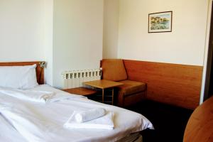 Postel nebo postele na pokoji v ubytování R&G Hotel