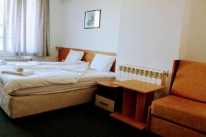 Postel nebo postele na pokoji v ubytování R&G Hotel