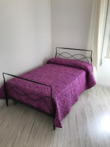Postel nebo postele na pokoji v ubytování Aria Di Mare B&b