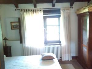 Cama o camas de una habitación en Hotel Rural Natxiondo