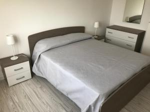 Postel nebo postele na pokoji v ubytování Aria Di Mare B&b