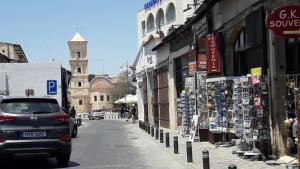 a car parked on the side of a street at Marina's Rooms in Larnaca
