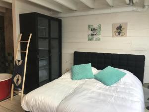 Postel nebo postele na pokoji v ubytování B&B de Petrakerk