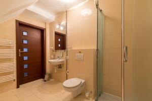 Koupelna v ubytování Hotel Skalite Spa & Wellness