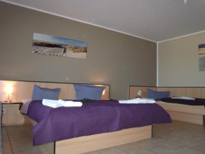 Postel nebo postele na pokoji v ubytování Hotel Bergmühle