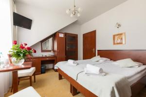 Postel nebo postele na pokoji v ubytování Hotel Skalite Spa & Wellness
