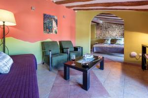 Postel nebo postele na pokoji v ubytování Hotel Cal Llop