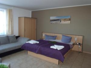 Postel nebo postele na pokoji v ubytování Hotel Bergmühle