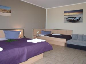 Postel nebo postele na pokoji v ubytování Hotel Bergmühle