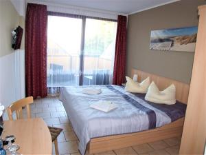 Postel nebo postele na pokoji v ubytování Hotel Bergmühle
