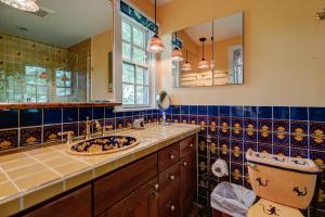 a bathroom with a sink and a toilet at Vintage Rockport Escape in Rockport +36 photos
