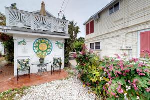 a house with a mural on the side of it at Truman @ Duval in Key West