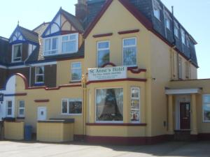 a building with a sign on the front of it at St Annes in Great Yarmouth