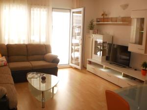 Posezení v ubytování Apartment Lana