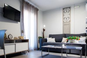 TV a/nebo společenská místnost v ubytování Pomegranade Luxury Apartment