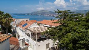 a view of buildings and the ocean from above at Villa Hurem in Trogir