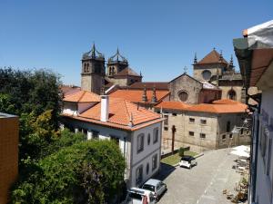 an aerial view of a city with a church at Downtown Cathedral Apartment in Braga