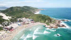 an aerial view of a beach with a crowd of people at Cris Hotel in Florianópolis