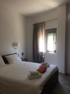 Postel nebo postele na pokoji v ubytování Melita Apartment Seaside + 37 fotografií