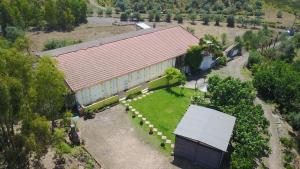 an overhead view of a large building with a yard at Il Girasole Alloggio in Fluminimaggiore