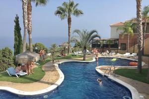 Bazén v ubytování Tropical Andalusian place nebo v jeho okolí