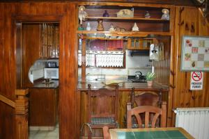 A cozinha ou cozinha compacta de Cabañas Bosque Del Faldeo