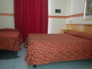 Postel nebo postele na pokoji v ubytování Villa Athena