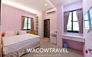 Postel nebo postele na pokoji v ubytování Mann Liuqiu Homestay
