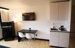 Kuchyň nebo kuchyňský kout v ubytování MN Hotel by WMM Hotels