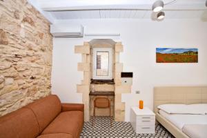 Postel nebo postele na pokoji v ubytování B&B Bianco E Blu