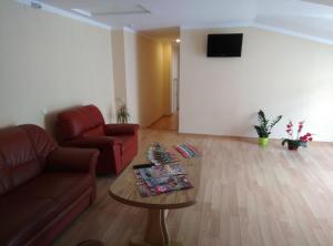 Posezení v ubytování Tukums apartments