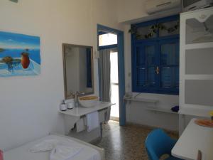 a bathroom with a sink and a mirror at FLORIDA HOTEL-Breakfast, ADULTS only in Rhodes Town