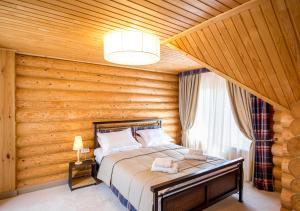 Ліжко або ліжка в номері Шалe у Пилипці Chalet Pylypets