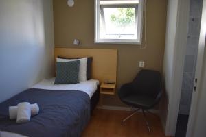 Postel nebo postele na pokoji v ubytování Håveruds hotell och konferens