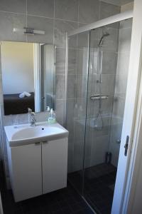 Koupelna v ubytování Håveruds hotell och konferens + 37 fotografií