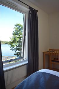 Postel nebo postele na pokoji v ubytování Håveruds hotell och konferens