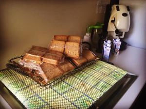 a pile of bread sitting on top of a table at Casa Albergo La Terza Stella in Agira