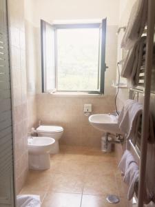 Koupelna v ubytování Albergo Villa Riccio