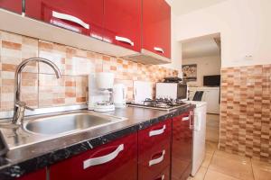 Kuchyň nebo kuchyňský kout v ubytování Apartman Barbara