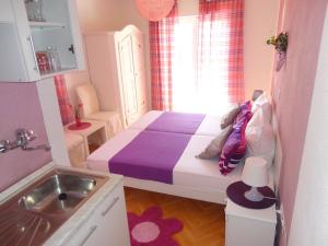 Postel nebo postele na pokoji v ubytování Apartments Veronika